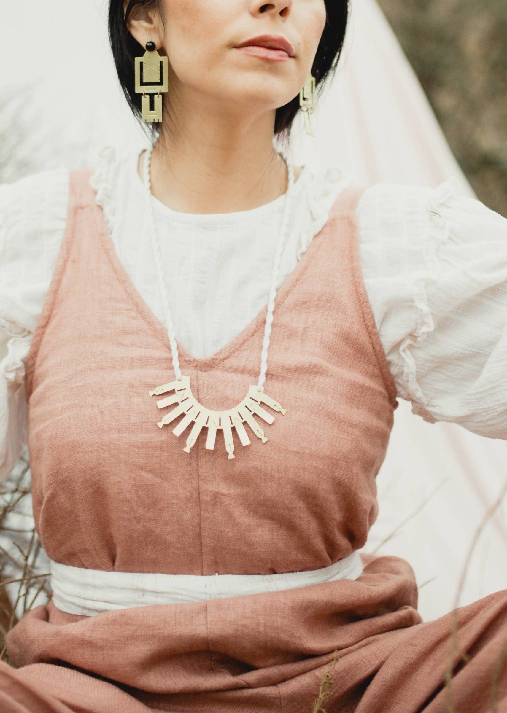 Model in Field Wearing Yucca Necklace