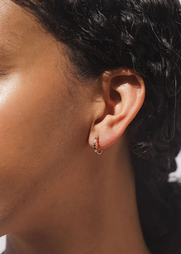 Baleen Empress hoops shown on a model