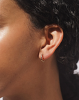Baleen Empress hoops shown on a model