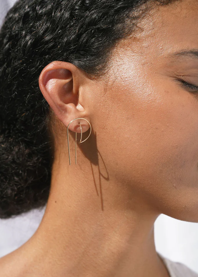 Silver gravity hoops by Baleen shown on a model