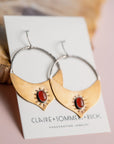 Gold Brass and Silver Madrasa hoop earrings with red stones by Claire Sommer Buck.