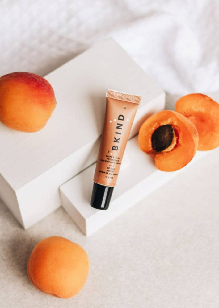 BKind Lip Balm in Berries With Apricots Surrounding
