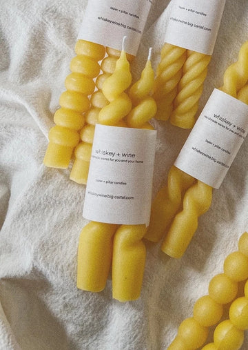 Set of Swirl Taper Candles in Natural Beeswax with Others Surrounding