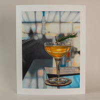 Art print of a high ball cocktail. Standing on a light pink background