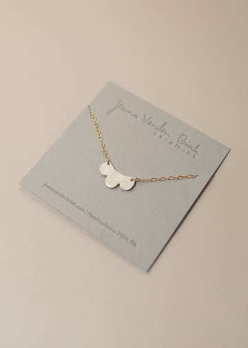 Petite Cloud Necklace on a jewelry card