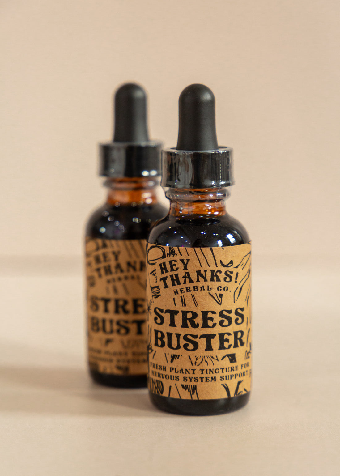 Two Amber Bottles Of Stress Buster Tinctures