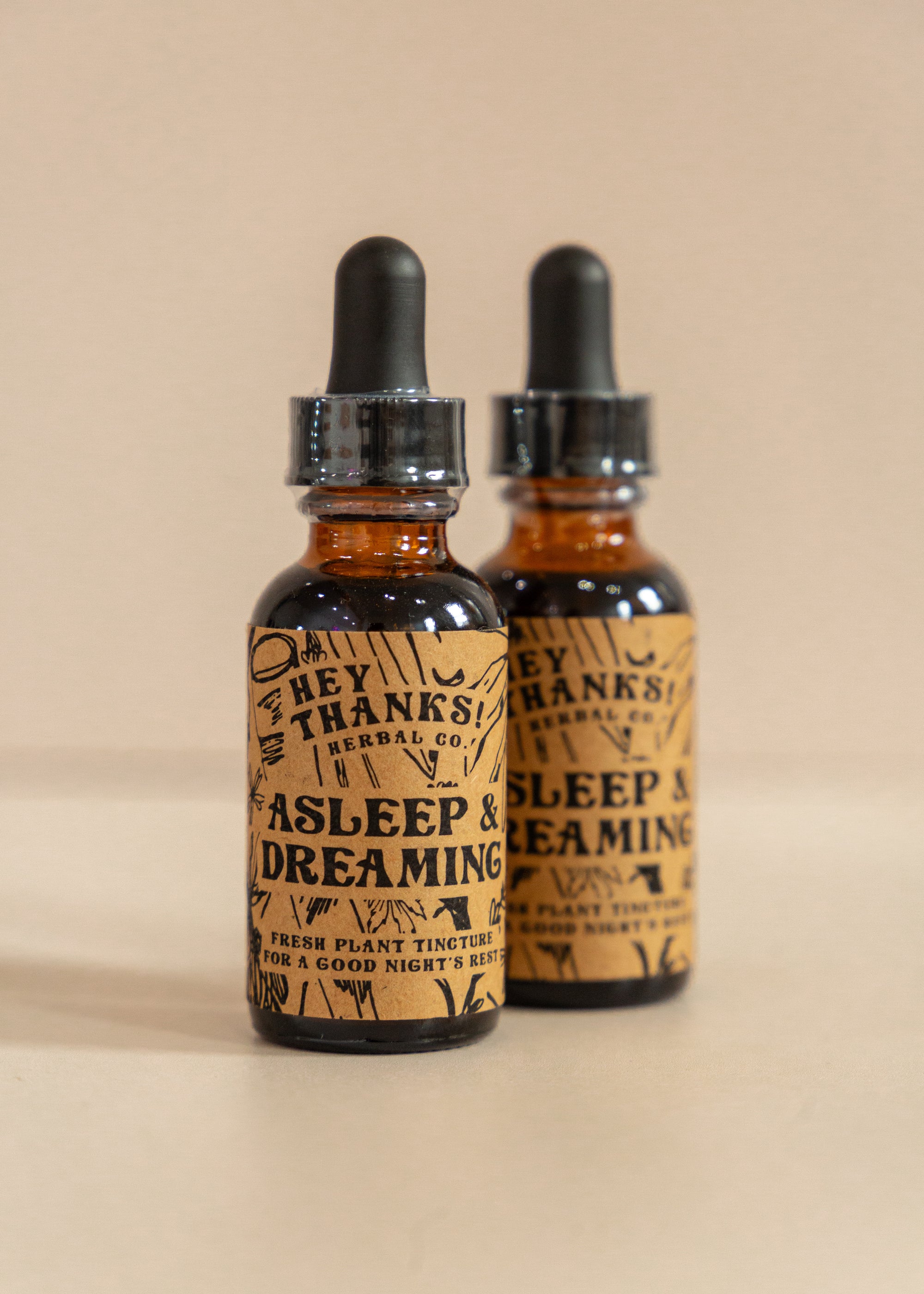 Two Amber Bottles of Asleep and Dreaming Tinctures