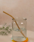 reusable gold straw in a mason jar