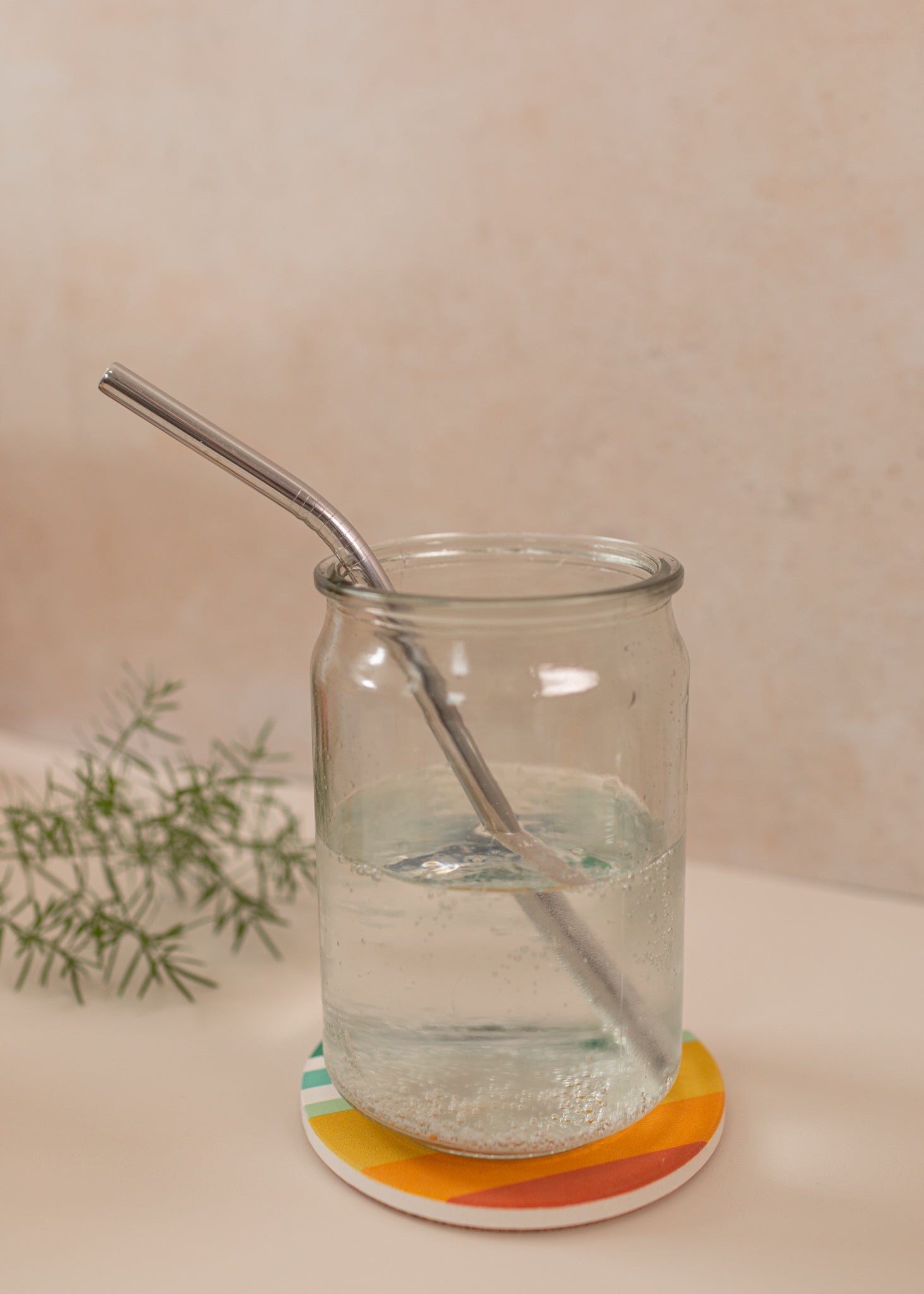 reusable silver straw in a mason jar