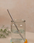 photo of a straight, silver reusable straw in a mason jar