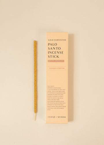 Palo Santo incense stick next to the box