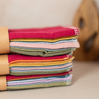 Three Packs of Colorful Reusable Paper Towels Stacked
