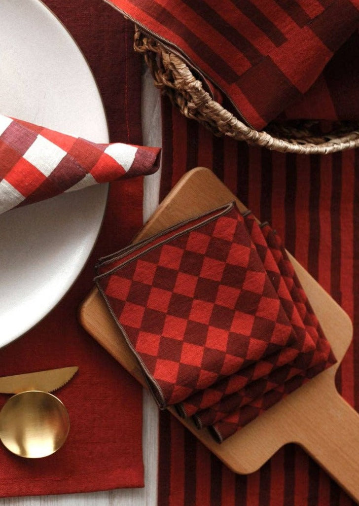 Table Setting with Diamond Ruby Cocktail Napkins on a Serving Board