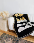 Moon Phases Cotton Throw Blanket on Couch