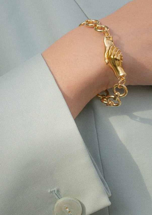 Model Wearing Gentlewoman&#39;s Agreement Bracelet in Gold