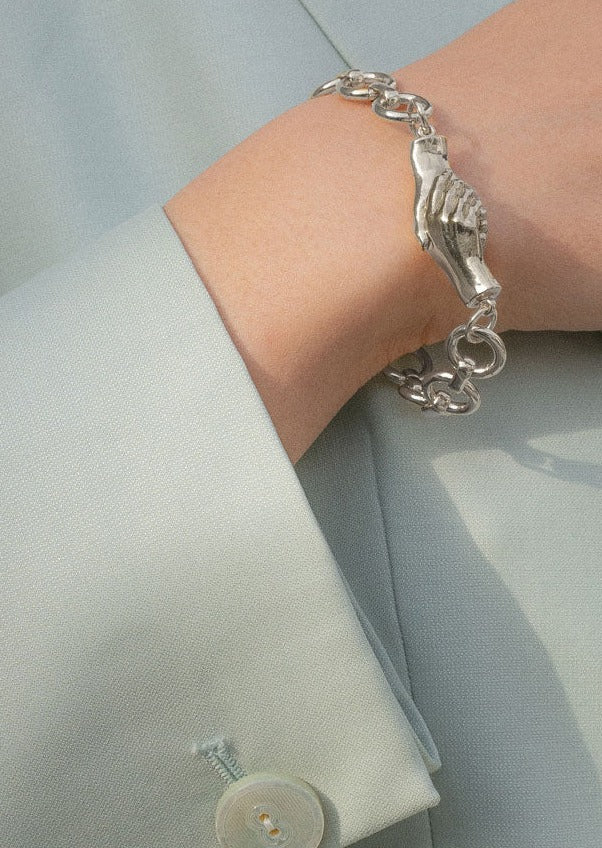 Model Wearing Gentlewoman's Agreement Bracelet In Silver