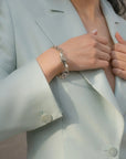 Model Wearing Gentlewomans Agreement Bracelet in Silver
