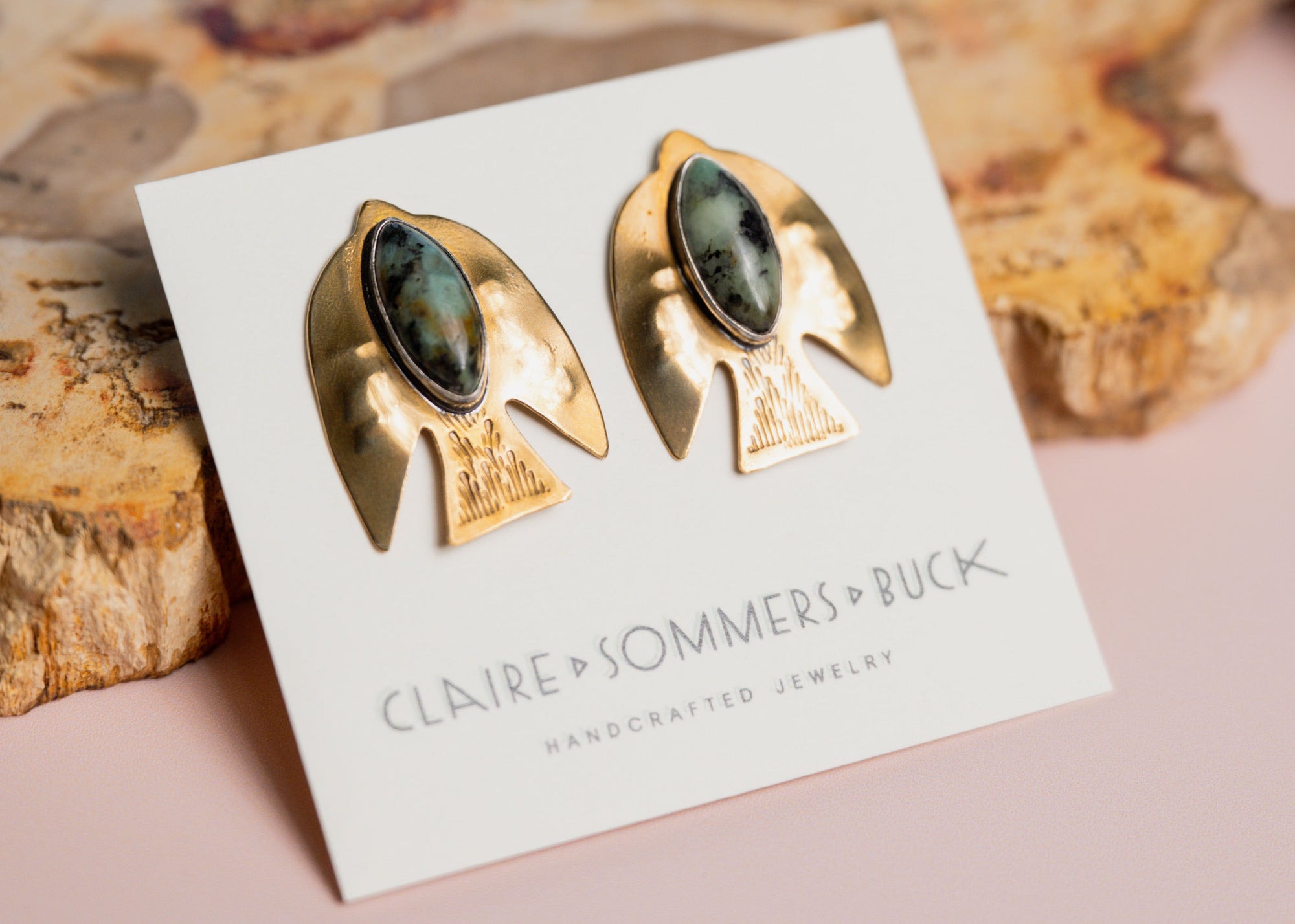 Paloma bird earrings with green gemstones by Claire Sommers Buck