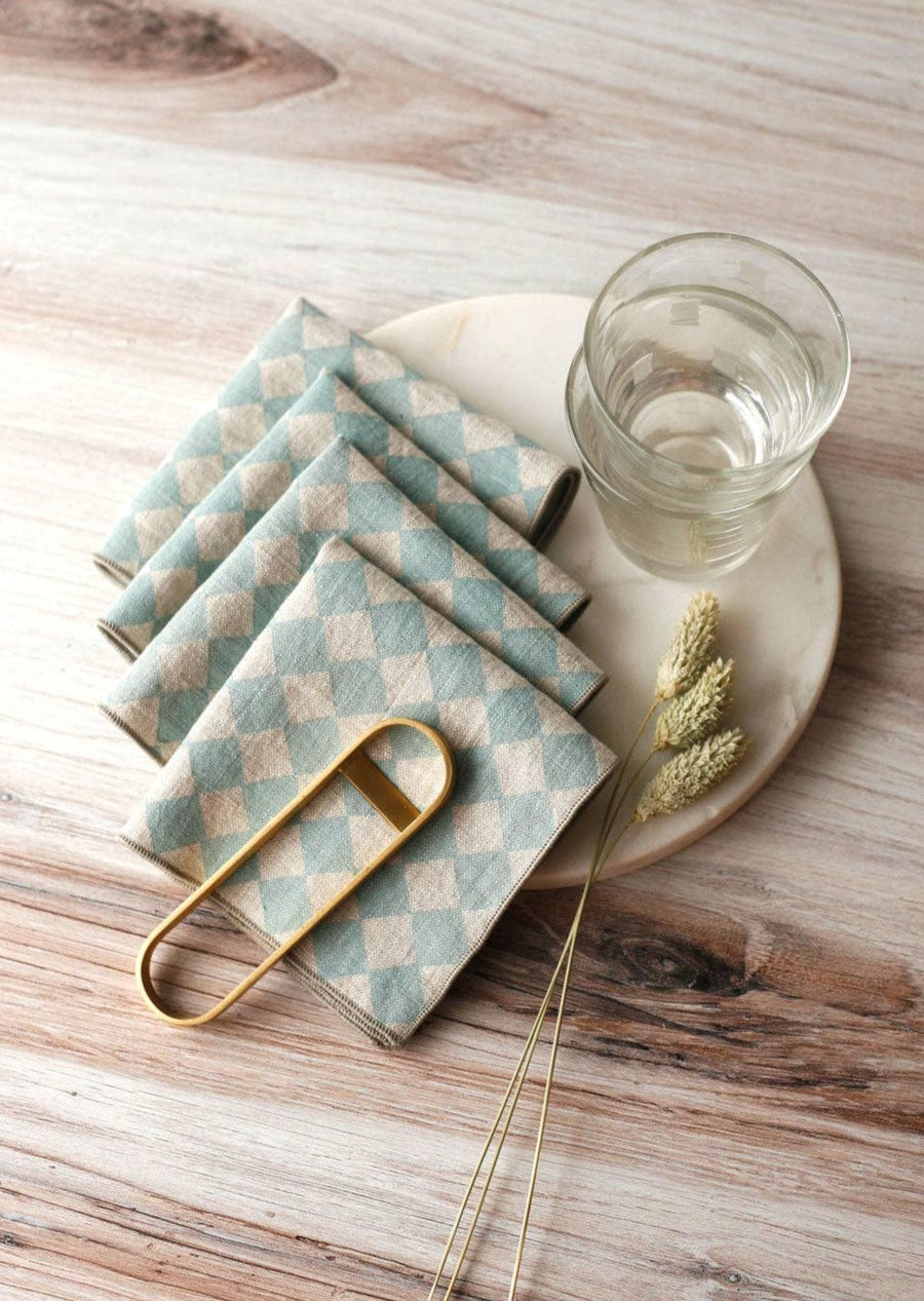 Set of Four Cocktail Napkins with Accessories Surrounding