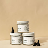three containers of Ama scented charcoal incense cones