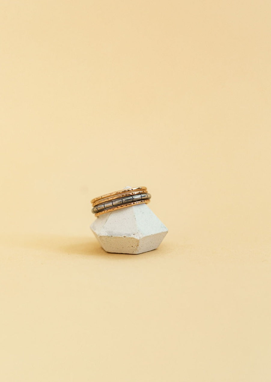 minimal-style ring on a clay ring holder