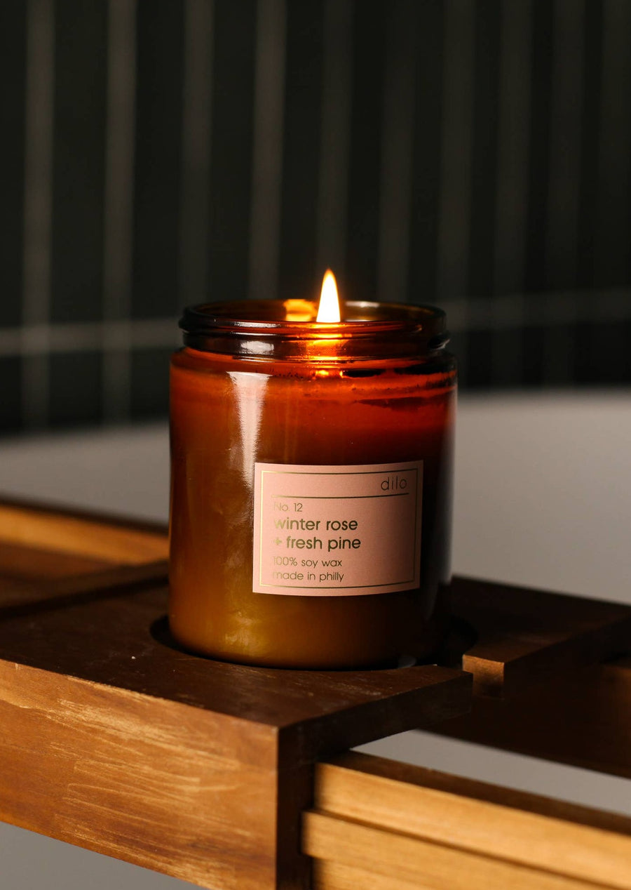 Winter Rose and Fresh Pine Candle over a Bath