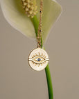 Blue Sapphire Evil Eye Pendant Necklace on a Flower Stem